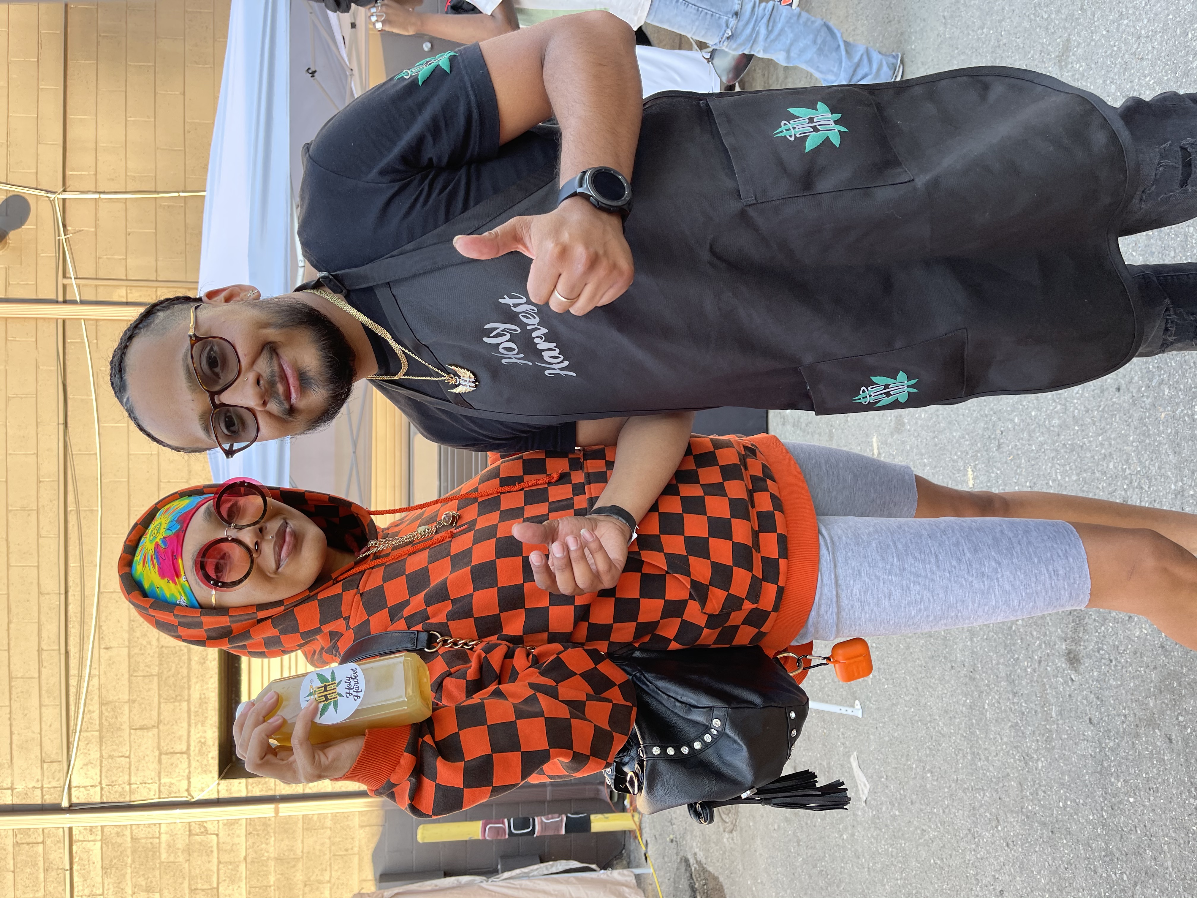 Founder with a customer at a lemonade event